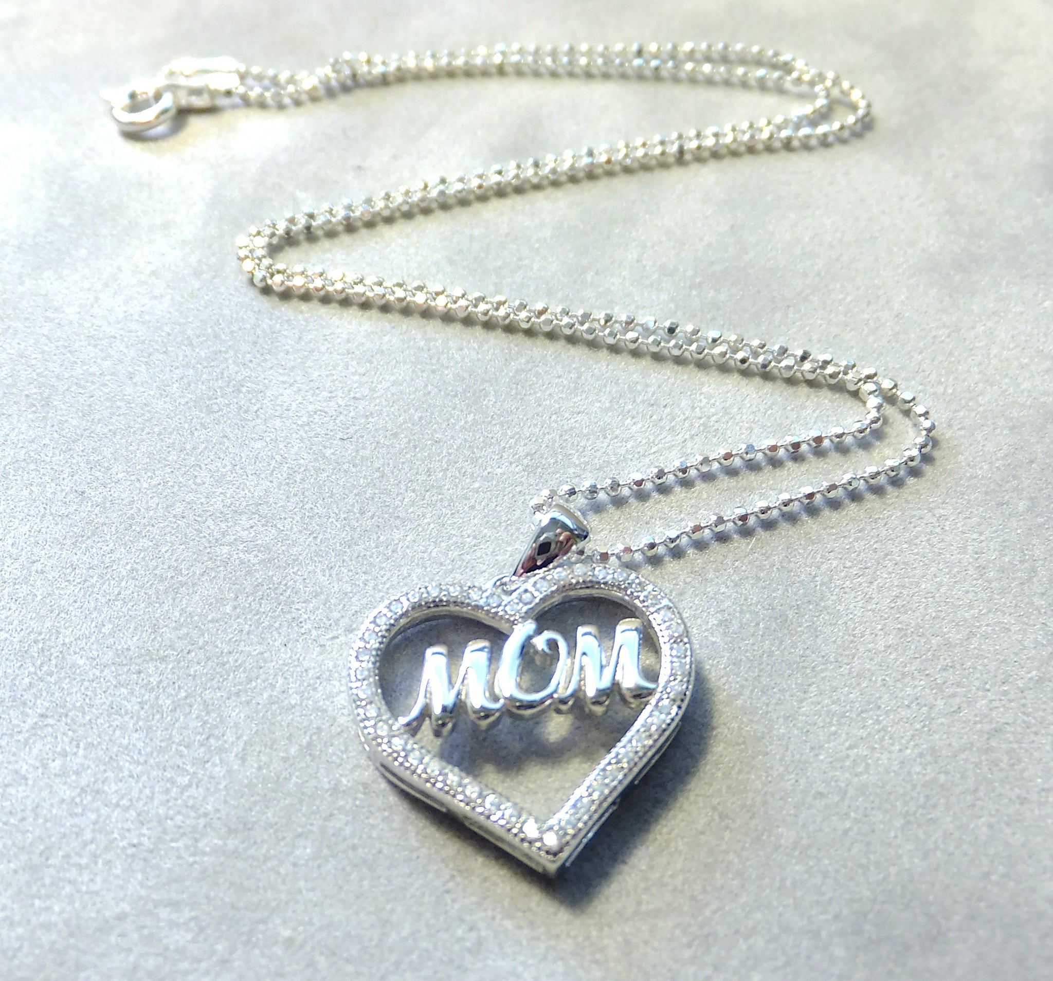 Heart Pendant Necklace That Says Mom in Sterling Silver The Butler Collection