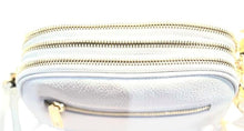 Load image into Gallery viewer, Top view of leather bag in white
