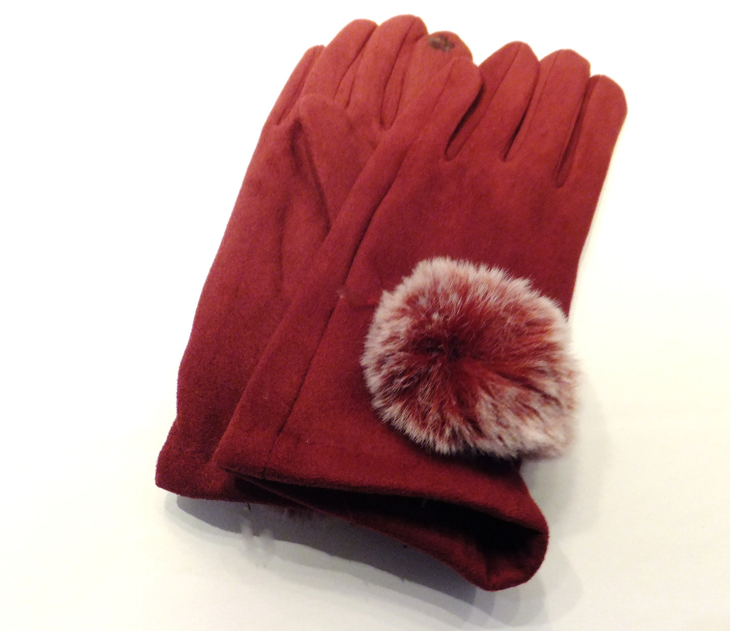Red suede glove with fur trim