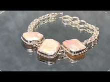 Load and play video in Gallery viewer, Video of white pearl bracelet 
