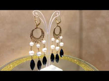 Load and play video in Gallery viewer, Statement white mother of pearl and black onyx gemstone earrings.
