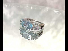 Load and play video in Gallery viewer, Video of blue topaz gemstone ring
