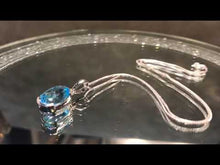 Load and play video in Gallery viewer, Blue topaz pendant necklace in sterling silver
