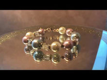 Load and play video in Gallery viewer, Mother of pearl bracelet in Multi colors
