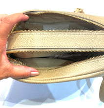 Load image into Gallery viewer, Inside view of beige leather bag
