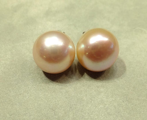 Pink pearl stud earrings